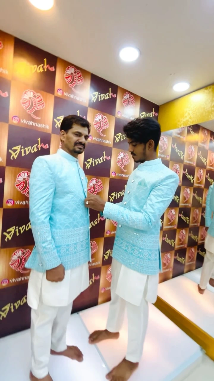 Pastel sky-blue embroidered Bundi ceremony jacket with tailored festive kurta
